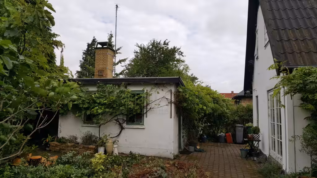 Før tilbygning i træ på adresse på Amager, København S